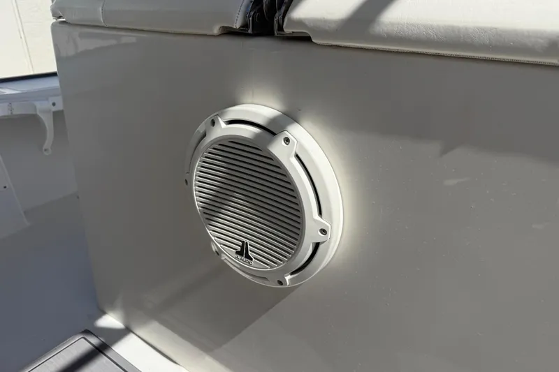  Yacht Photos Pics Boat speaker on a 2019 Calcutta 263, mounted on a sleek white surface.