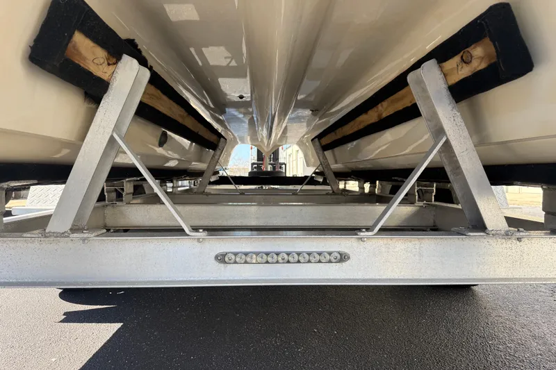  Yacht Photos Pics Calcutta 263 boat trailer underside view, showcasing support structure, 2019 model.