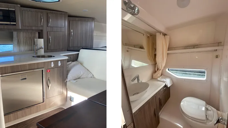  Yacht Photos Pics 2021 Regal 33 Express interior: modern kitchen and bathroom with wood cabinetry and sleek fixtures.