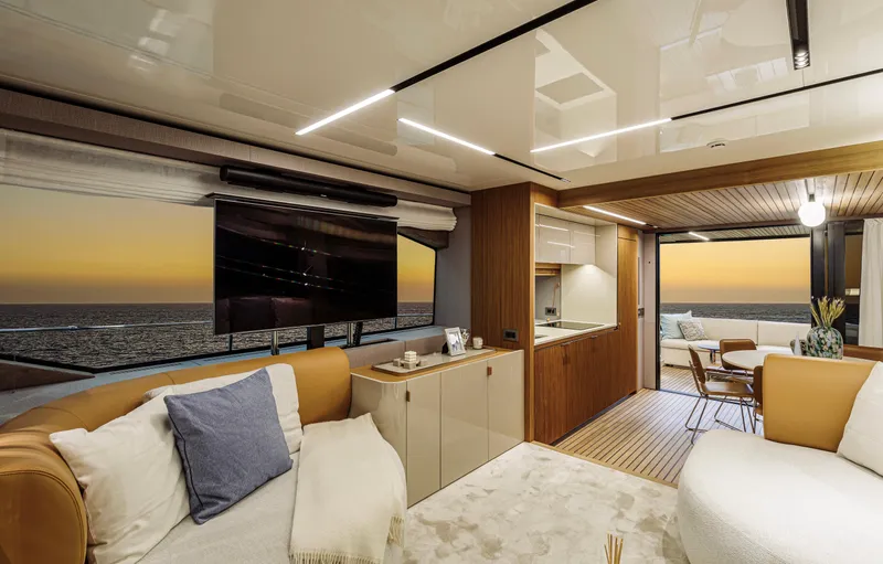  Yacht Photos Pics Luxurious interior of 2025 Cranchi Sessantadue 62 yacht with ocean sunset view.