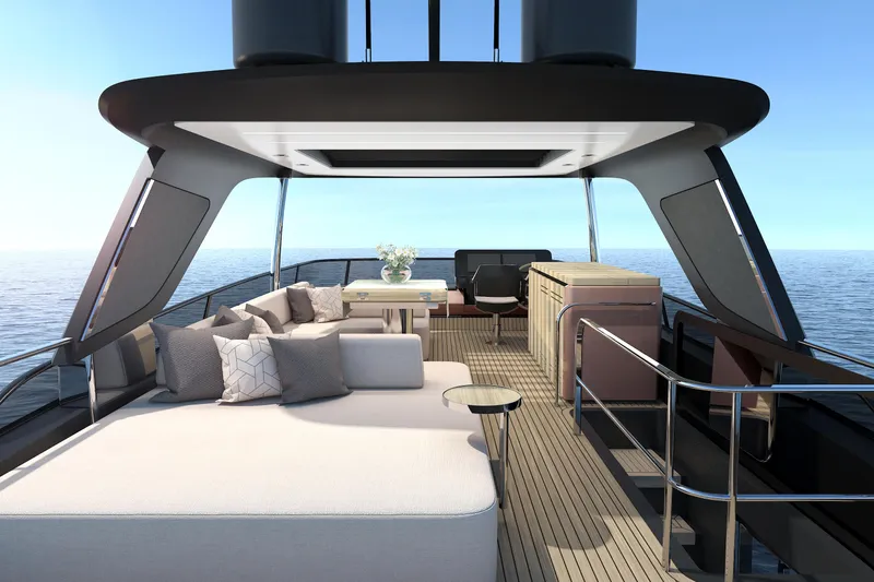  Yacht Photos Pics Luxurious 2025 Cranchi Sessantadue 62 yacht deck with elegant seating and ocean view.