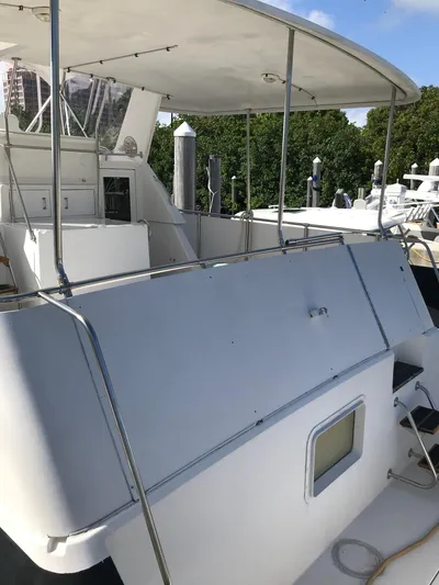  Yacht Photos Pics 1994 Hatteras 42 Cockpit Motor Yacht with spacious deck and canopy.