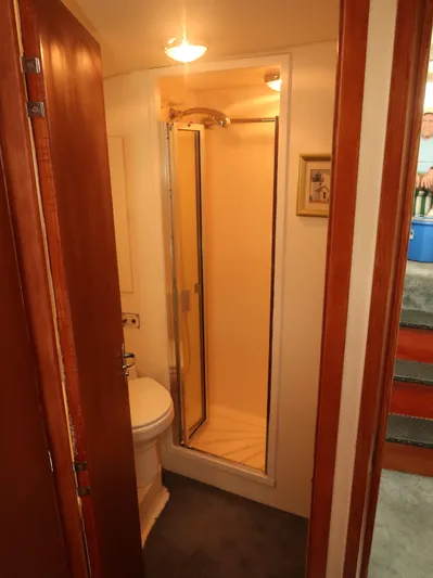  Yacht Photos Pics Bathroom interior of 1994 Hatteras 42 Cockpit Motor Yacht with shower and toilet.