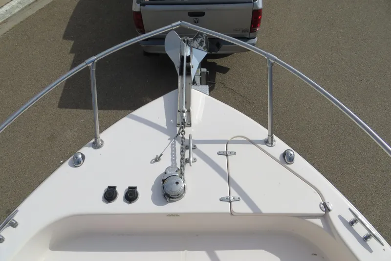  Yacht Photos Pics 2009 Grady-White Chesapeake 290 boat bow with anchor, trailer, and railing.