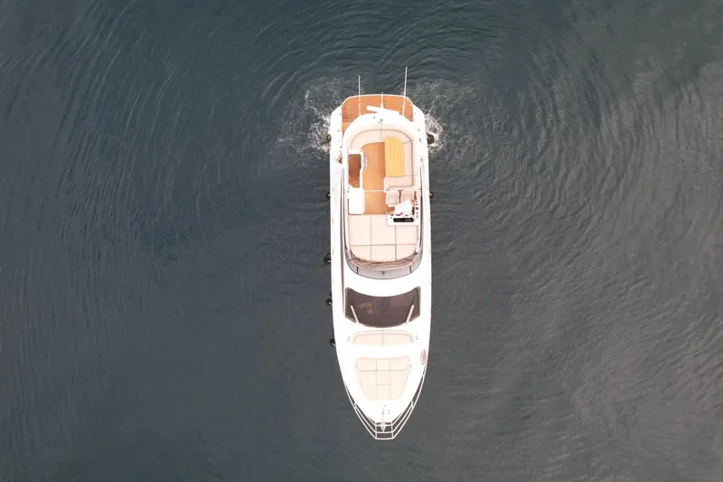  Yacht Photos Pics Aerial view of 2024 Azimut Fly 53 yacht cruising on calm water.