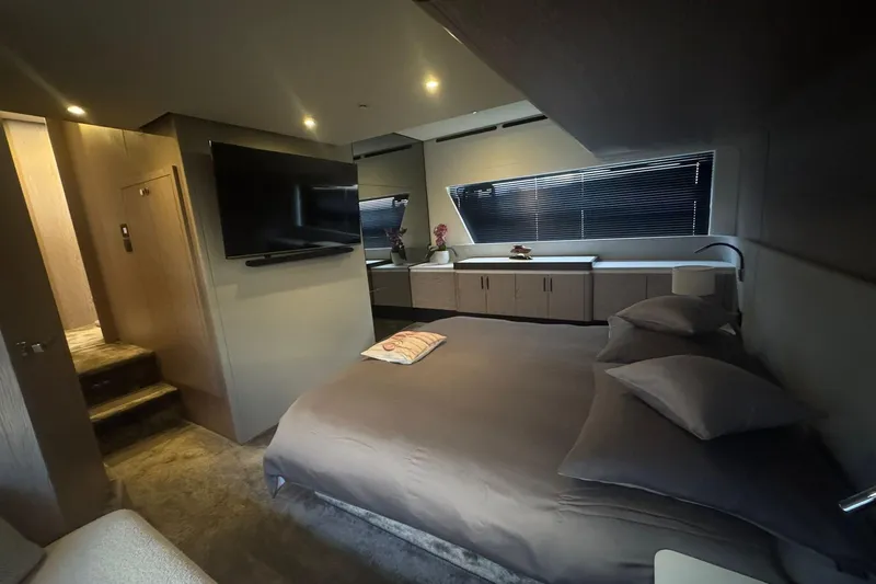  Yacht Photos Pics Luxurious bedroom interior of 2024 Azimut Fly 53 yacht with modern design and amenities.