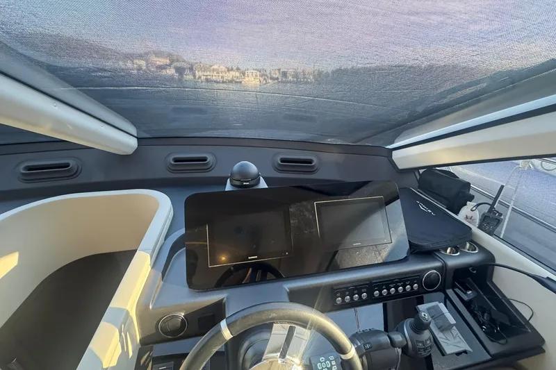  Yacht Photos Pics Interior cockpit of 2024 Azimut Fly 53 yacht with modern navigation equipment.