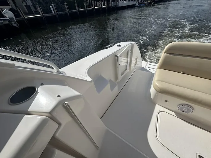 2008 Tiara 3500 Sovran Yacht Photos Pics 2008 Tiara Yachts 3500 Sovran deck with seating, overlooking water.