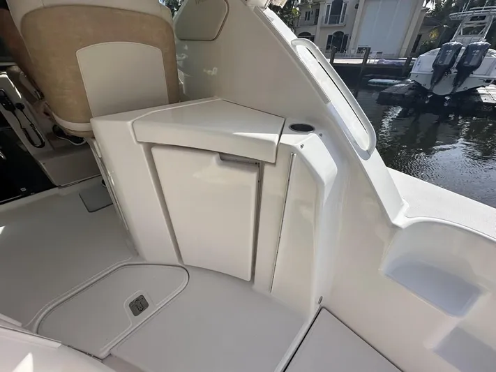 2008 Tiara 3500 Sovran Yacht Photos Pics 2008 Tiara Yachts 3500 Sovran interior detail with seating and storage compartment.