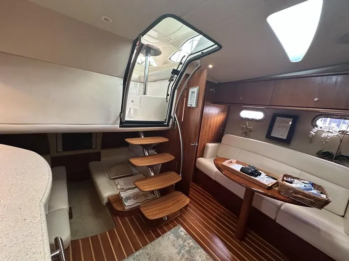 2008 Tiara 3500 Sovran Yacht Photos Pics 2008 Tiara Yachts 3500 Sovran interior with wooden steps, seating, and elegant design.