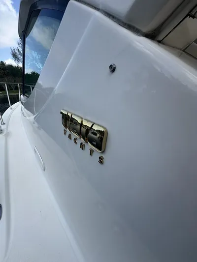 2008 Tiara 3500 Sovran Yacht Photos Pics 2008 Tiara Yachts 3500 Sovran, sleek white exterior with logo detail.