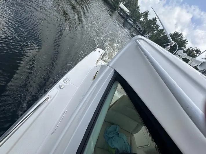 2008 Tiara 3500 Sovran Yacht Photos Pics 2008 Tiara Yachts 3500 Sovran cruising on calm waters under a partly cloudy sky.