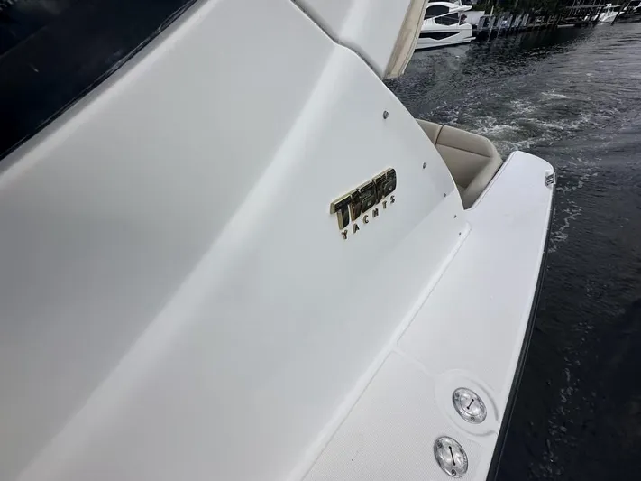 2008 Tiara 3500 Sovran Yacht Photos Pics 2008 Tiara Yachts 3500 Sovran on water, showcasing sleek design and branding.