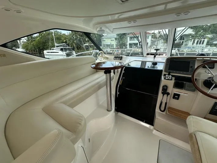 2008 Tiara 3500 Sovran Yacht Photos Pics 2008 Tiara Yachts 3500 Sovran interior with luxurious seating and modern helm controls.