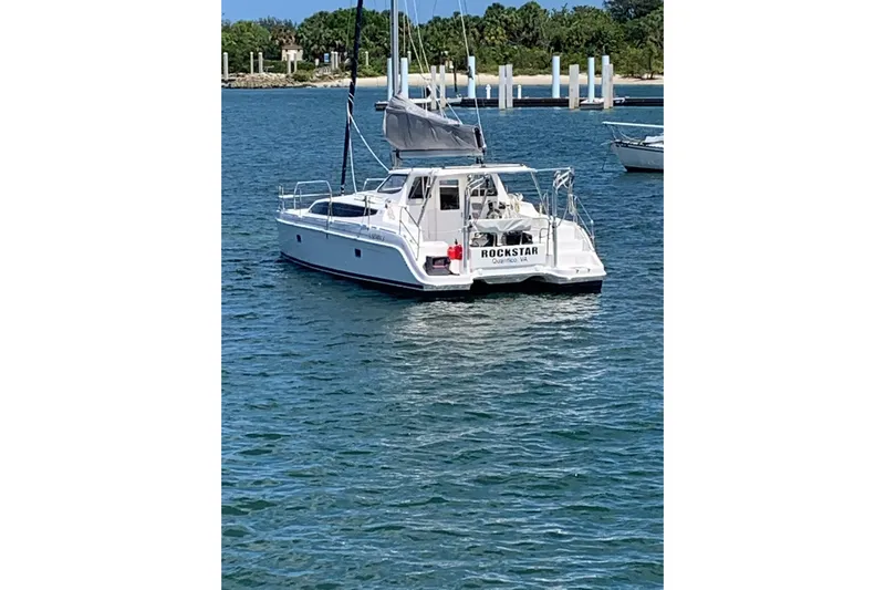 Rockstar Yacht Photos Pics 2013 Gemini Legacy catamaran "Rockstar" anchored in calm waters.
