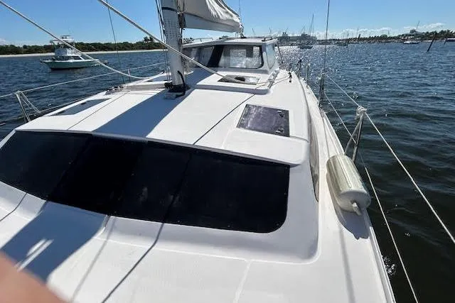 Rockstar Yacht Photos Pics 2013 Gemini Legacy sailboat on water, featuring sleek deck design and rigging.