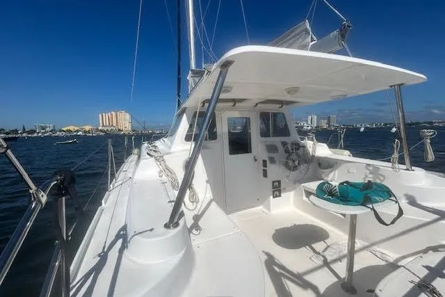 Rockstar Yacht Photos Pics 2013 Gemini Legacy sailboat on water, featuring spacious deck and clear blue sky.
