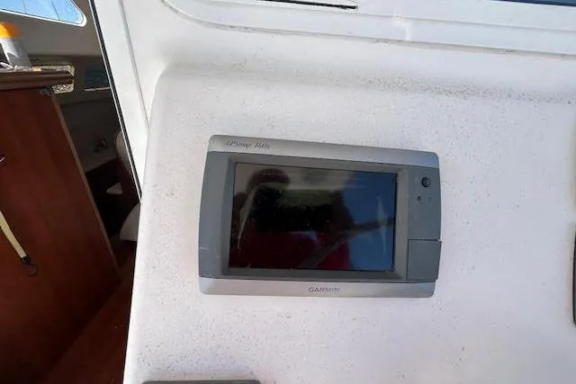 Rockstar Yacht Photos Pics Garmin GPS device on 2013 Gemini Legacy boat dashboard.