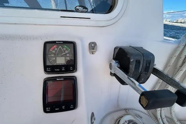 Rockstar Yacht Photos Pics 2013 Gemini Legacy boat controls with Raymarine instruments and throttle lever.