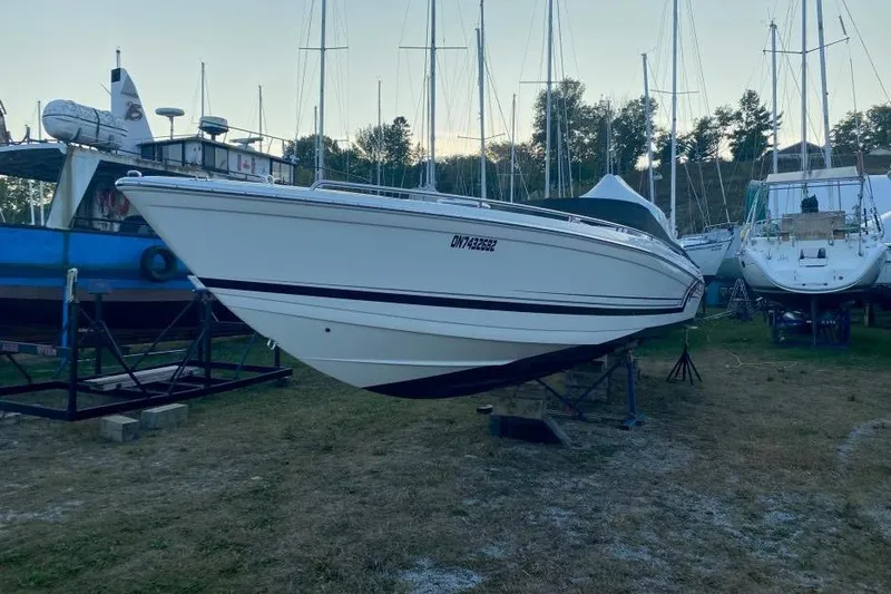  Yacht Photos Pics 2016 Formula 353 FASTech boat on dry dock, surrounded by other vessels.
