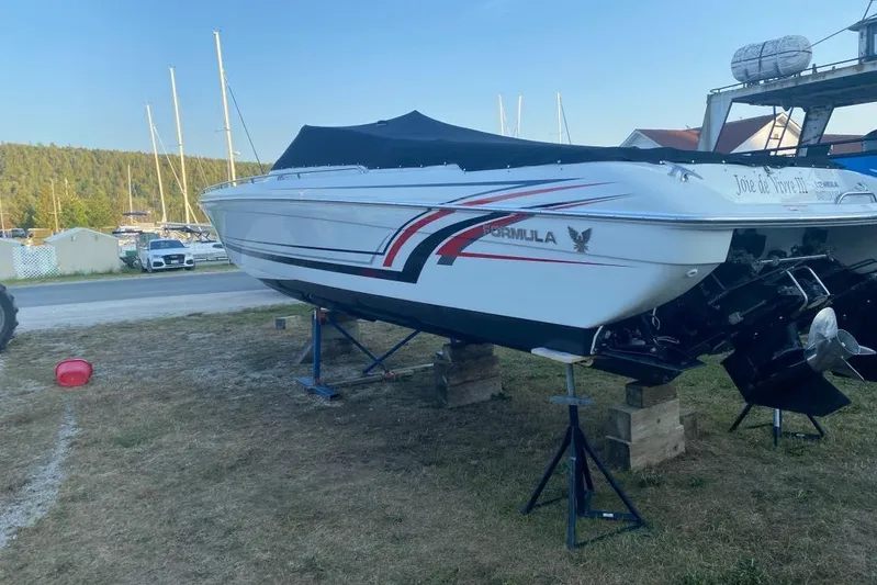  Yacht Photos Pics 2016 Formula 353 FASTech boat on stands, covered, near marina.