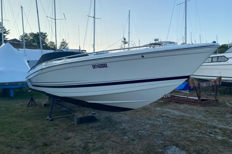  Yacht Photos Pics 2016 Formula 353 FASTech boat on dry dock, surrounded by other vessels.