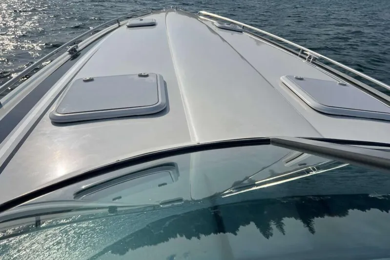  Yacht Photos Pics 2016 Formula 353 FASTech boat deck on water, showcasing sleek design and hatches.