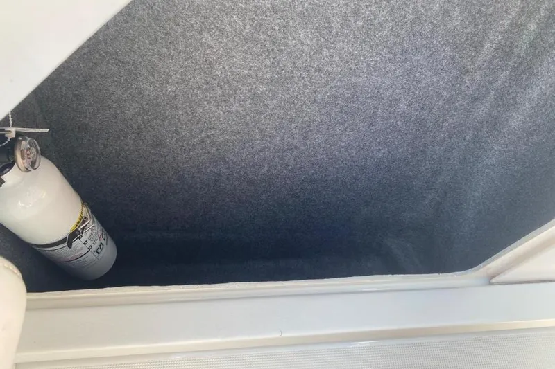  Yacht Photos Pics Storage compartment with fire extinguisher in 2016 Formula 353 FASTech boat.