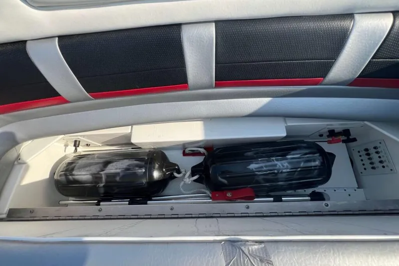  Yacht Photos Pics 2016 Formula 353 FASTech boat storage compartment with fenders and safety equipment.