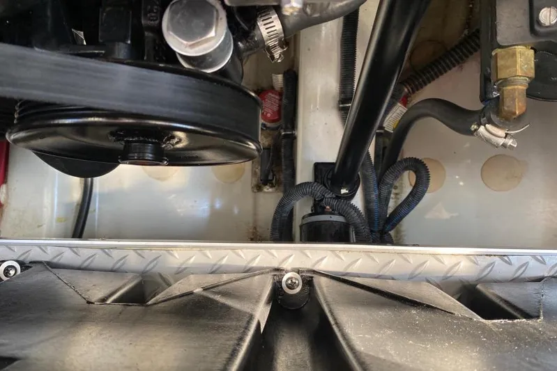  Yacht Photos Pics Engine compartment of a 2016 Formula 353 FASTech boat, showing belts and hoses.