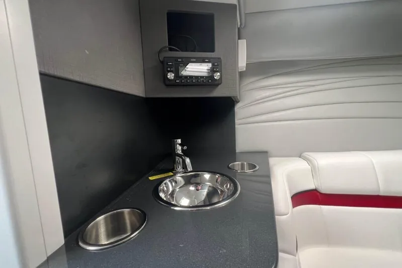  Yacht Photos Pics 2016 Formula 353 FASTech interior with sink, stereo, and white seating.
