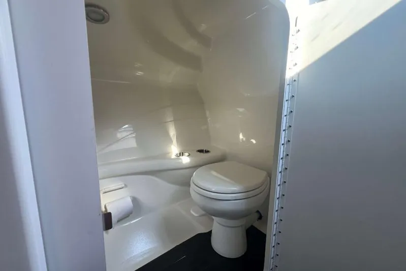  Yacht Photos Pics 2016 Formula 353 FASTech boat bathroom interior with toilet and sleek design.