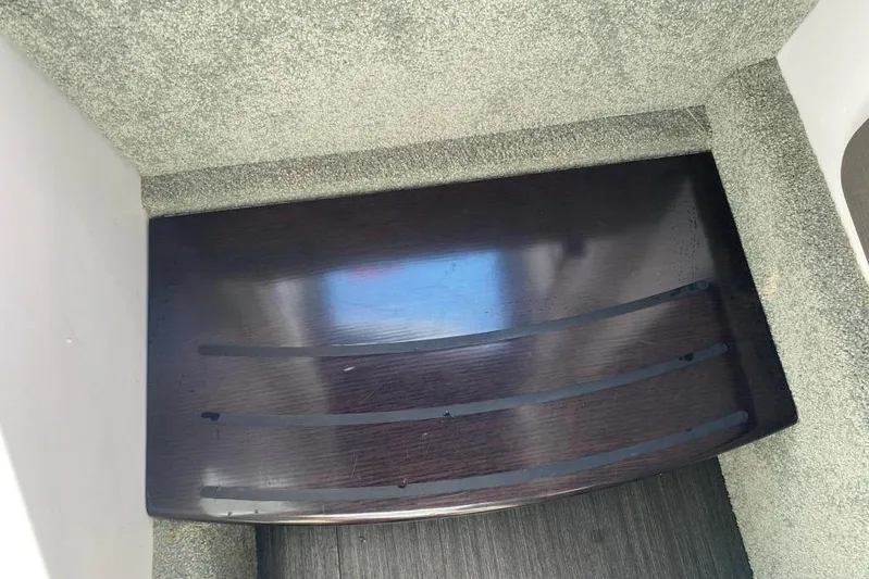  Yacht Photos Pics 2016 Formula 353 FASTech interior with dark wood step and carpeted surroundings.