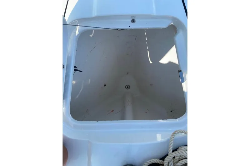  Yacht Photos Pics Open storage compartment on a 2016 Formula 353 FASTech boat, featuring a clean interior.