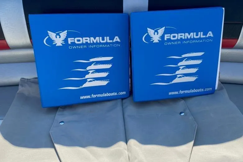  Yacht Photos Pics Blue Formula 353 FASTech 2016 owner manuals on boat seat.