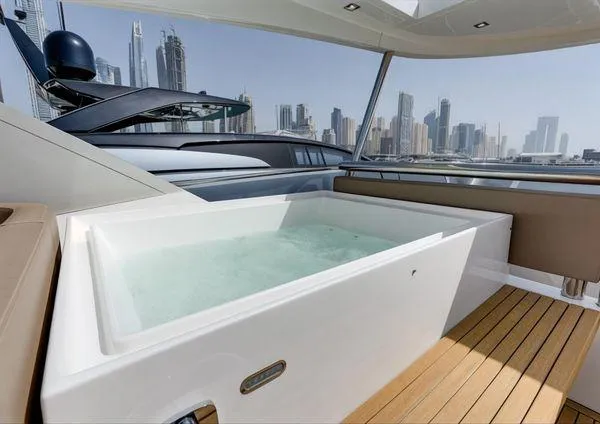  Yacht Photos Pics Luxurious 2018 Galeon 780 Crystal yacht with jacuzzi, city skyline in background.