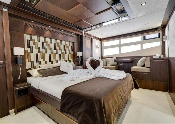  Yacht Photos Pics Luxurious bedroom interior on 2018 Galeon 780 Crystal yacht with elegant wood finishes.