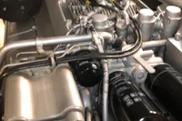 Engine of a 2008 Pershing 90 yacht, showcasing intricate mechanical components.