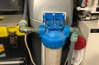 Engine room of 2008 Pershing 90 yacht with filtration system and equipment.