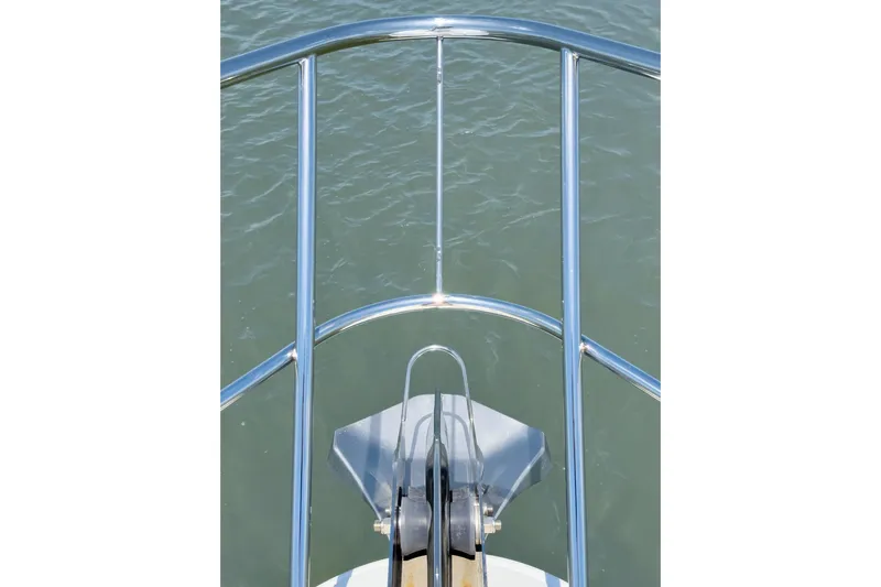  Yacht Photos Pics Bow view of 2020 Riviera 4800 Sport Yacht with stainless steel railings.