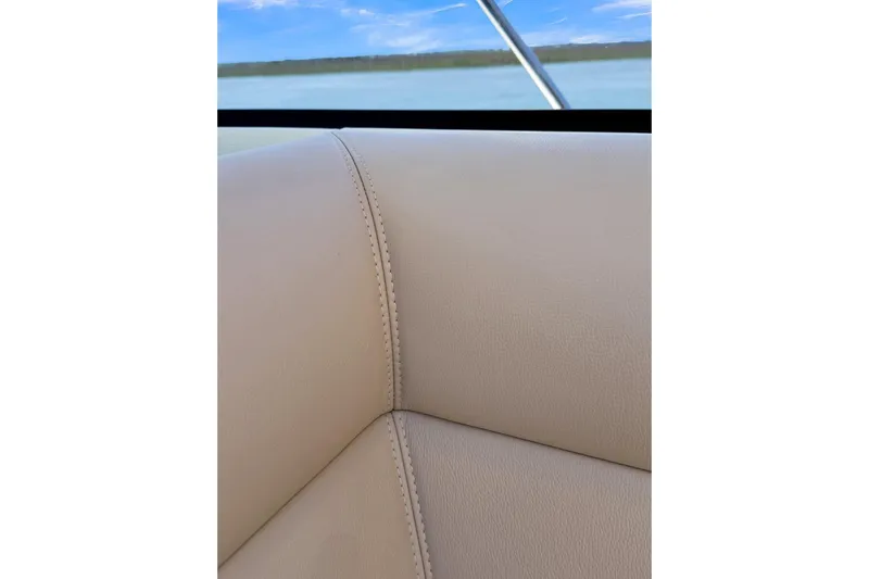  Yacht Photos Pics Close-up of beige leather seating on a 2020 Riviera 4800 Sport Yacht.