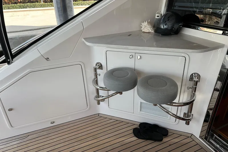 Our Trade Yacht Photos Pics Interior of 2023 Belize 54 Day Bridge yacht with bar stools and countertop.