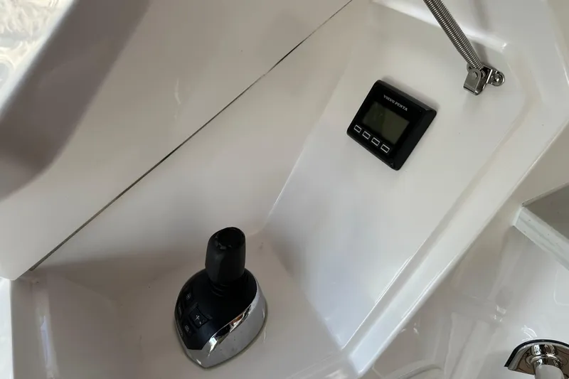 Our Trade Yacht Photos Pics Control panel of 2023 Belize 54 Day Bridge yacht with joystick and display.