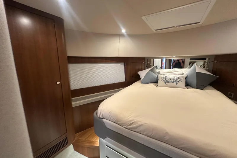 Our Trade Yacht Photos Pics Luxurious cabin interior of 2023 Belize 54 Day Bridge yacht with cozy bedding.