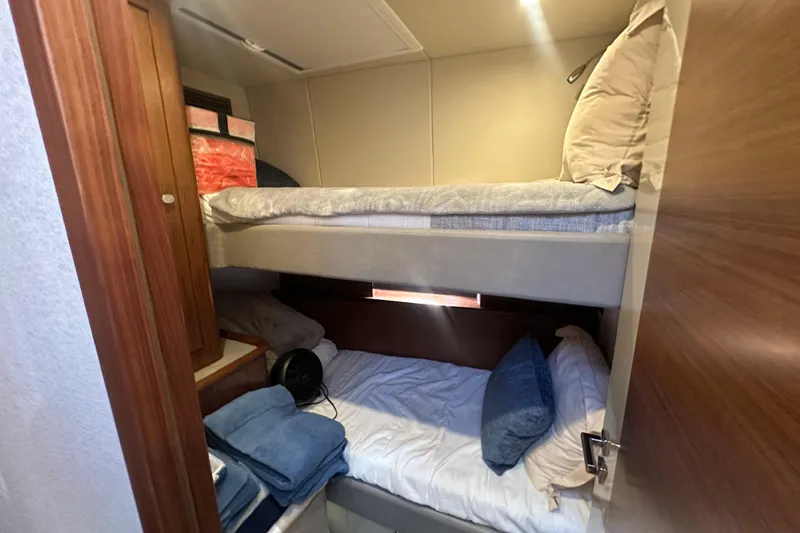 Our Trade Yacht Photos Pics Cozy cabin with bunk beds in 2023 Belize 54 Day Bridge yacht.
