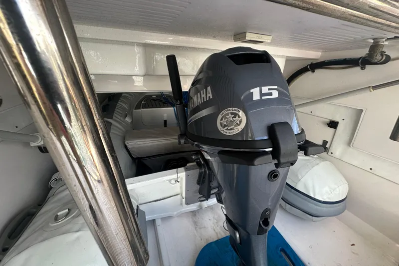 Our Trade Yacht Photos Pics 2023 Belize 54 Day Bridge boat interior with Yamaha 15 outboard motor.