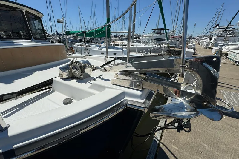 Point Aft'r Yacht Photos Pics 2012 Ranger Tugs R-29 boat docked, showcasing anchor and deck details.