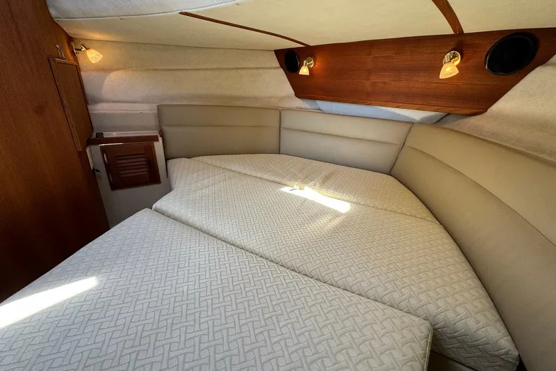 Point Aft'r Yacht Photos Pics 2012 Ranger Tugs R-29 cabin interior with cozy bed and ambient lighting.