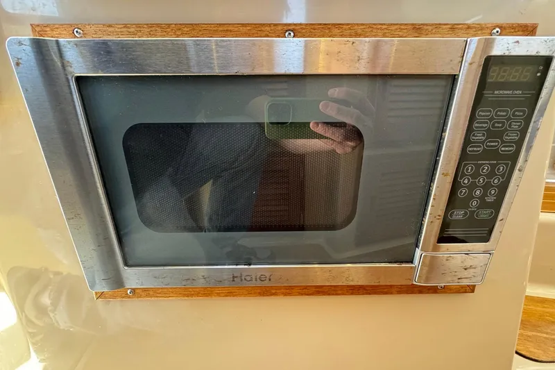 Point Aft'r Yacht Photos Pics Built-in Haier microwave in 2012 Ranger Tugs R-29 boat kitchen.