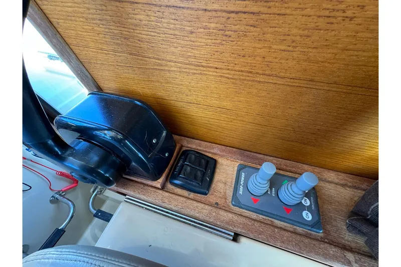 Point Aft'r Yacht Photos Pics 2012 Ranger Tugs R-29 boat controls with joystick and throttle on wooden panel.